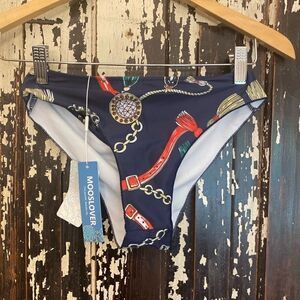 NWT Mooselover bikini bottom. Belt/Tassel print.